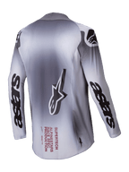 Alpinestars Maillot Supertech Maker 2025, maillot de motocross pour homme, argent et noir, vue de dos montrant la construction en mesh extensible et les logos de la marque