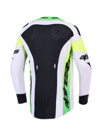 Maillot Alpinestars Supertech Dyna 2027 et ensemble MX, haut vert et noir avec ventilation dorsale découpée au laser.