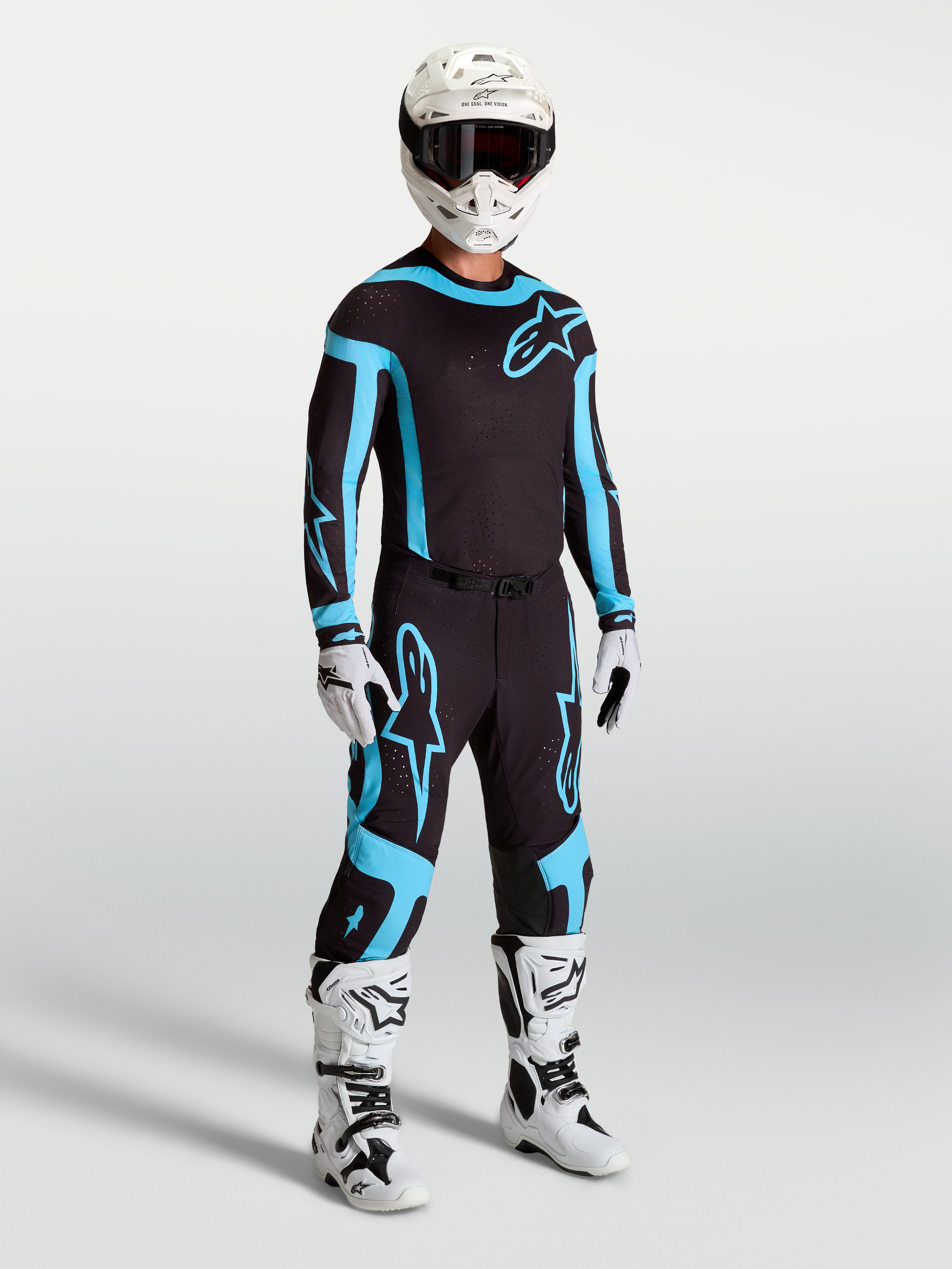 Maillot et ensemble Alpinestars Supertech Vesta, tenue de motocross pour homme, noire et turquoise, coupe athlétique.
