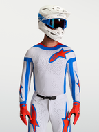 Maillot Supertech Vesta Alpinestars, haut de motocross lilas et rouge, maille respirante et coupe athlétique pour homme.