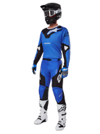 Alpinestars 2025 Racer Veil Gear Set, Blue and Black Motocross Jersey and Pants, complete MX racing outfit with black helmet, white goggles, and white boots, technical off-road gear