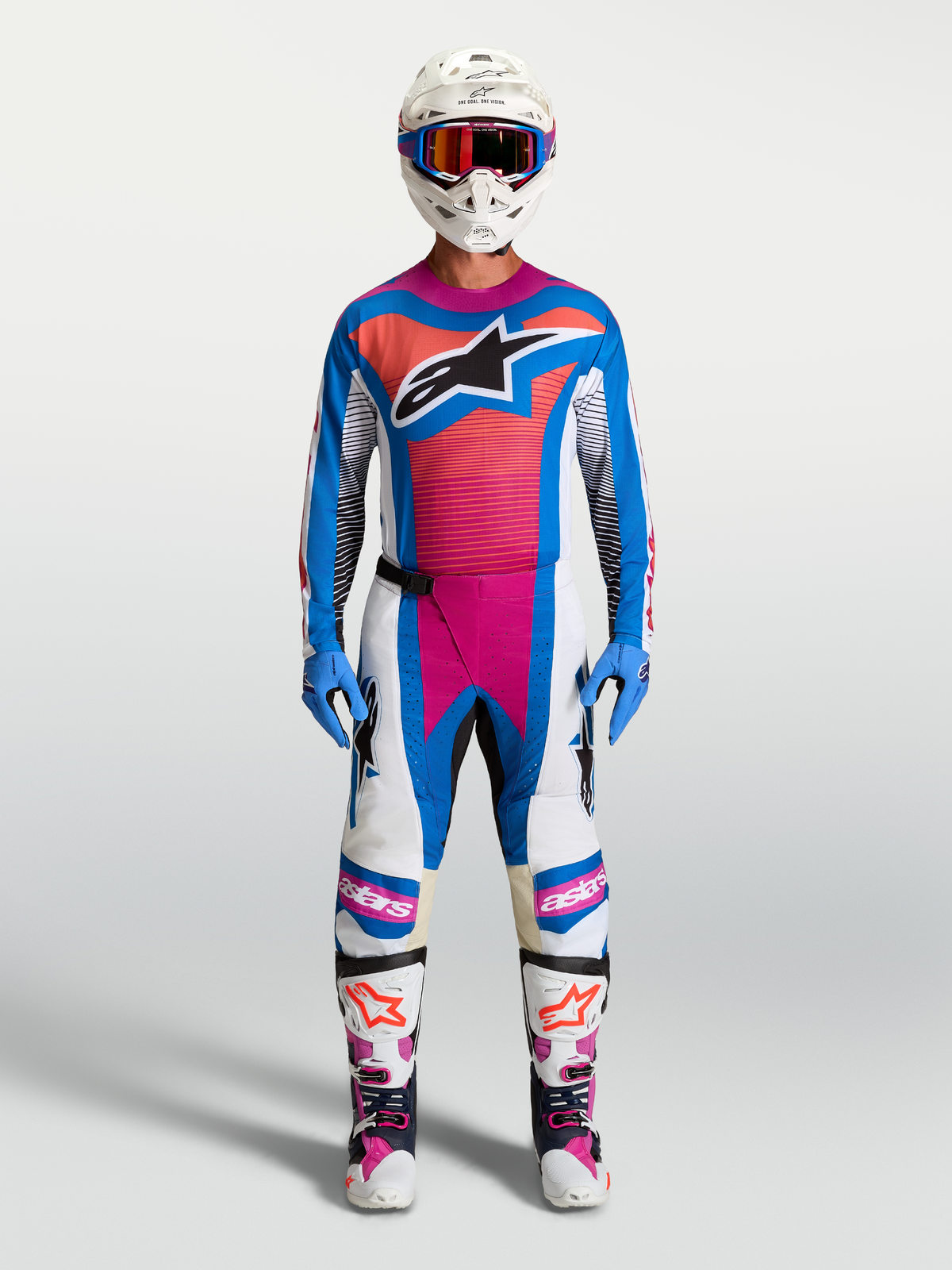Alpinestars maillot Techstar Maven et ensemble, tenue de motocross bleue et rose pour homme, coupe athlétique ergonomique.
