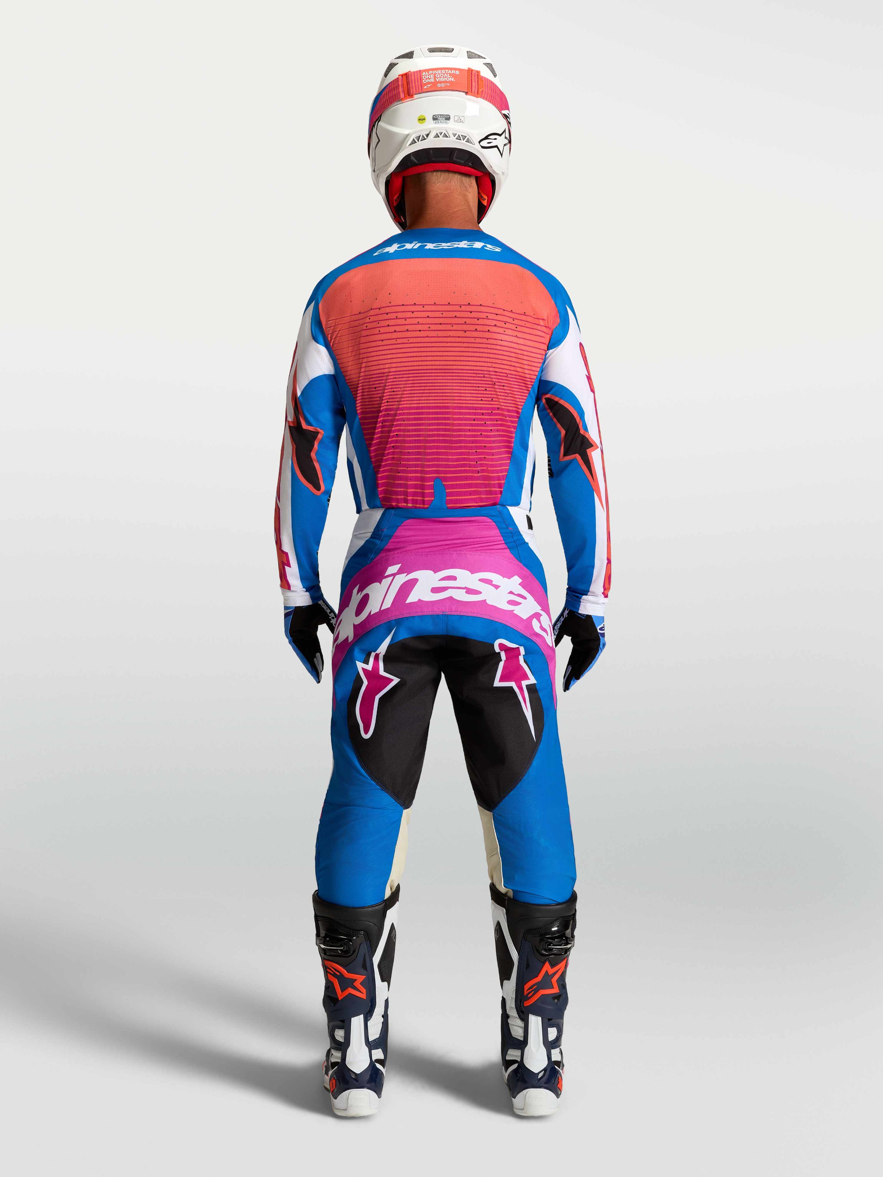Alpinestars Techstar Maven Jersey AND Techstar Maven Gear Set, blue and hot coral motocross racing gear, back view.