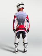 Alpinestars Techstar Maven Motocross Gear Set, Men's Fire Red and White racing jersey and pants, athletic fit, rear view.