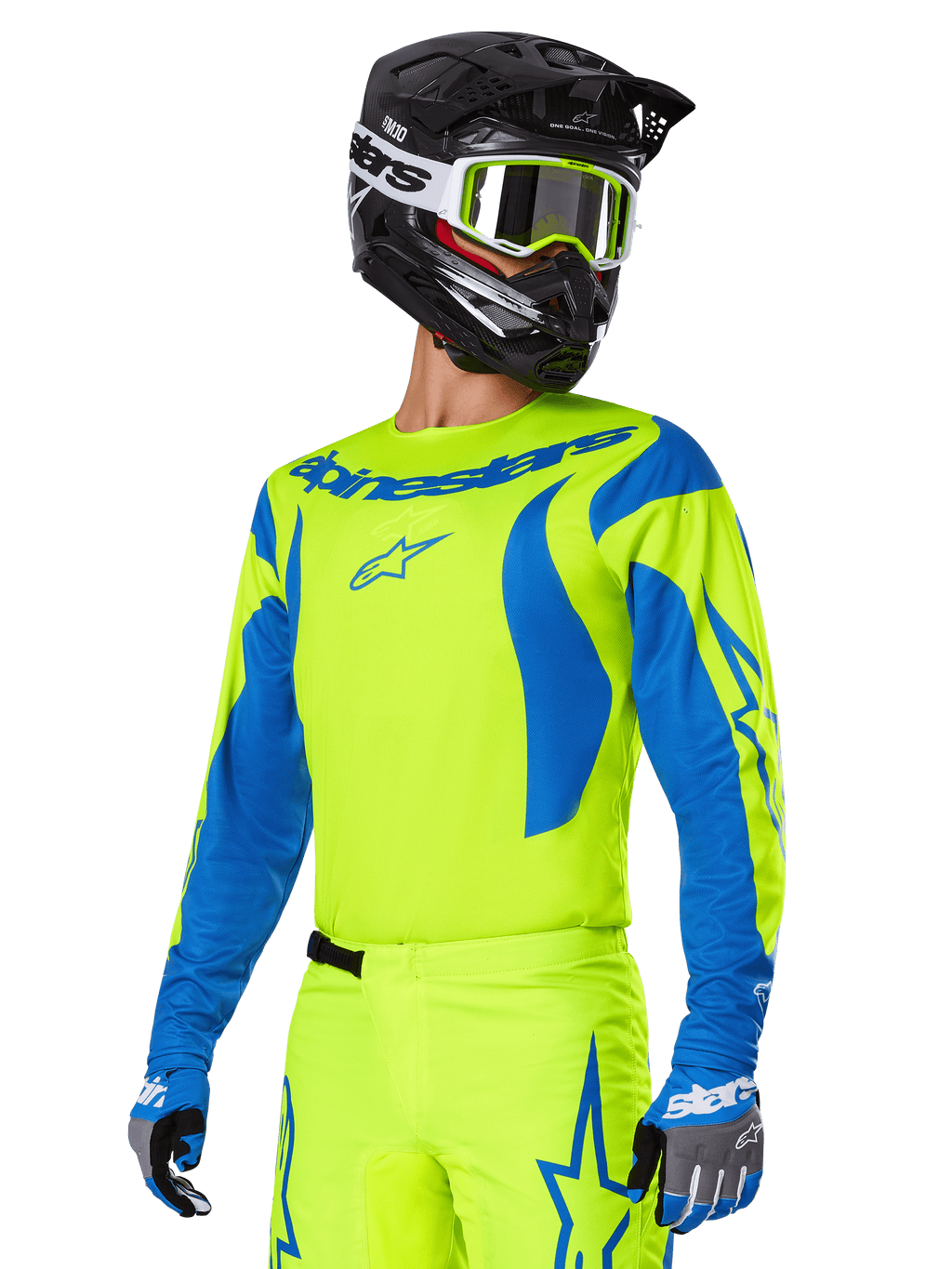 Ensemble d'équipement Alpinestars Fluid Haul 2025, maillot et pantalon de motocross, jaune vif et bleu, porté avec un casque noir et des lunettes à monture jaune, présente des motifs bleus ondulés sur les manches et des logos d'étoiles bleues sur le pantalon, tenue de course tout-terrain coordonnée