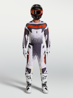 Alpinestars Techstar Swan Gear Set, gray and red fluo motocross racing jersey and pants for performance riding.