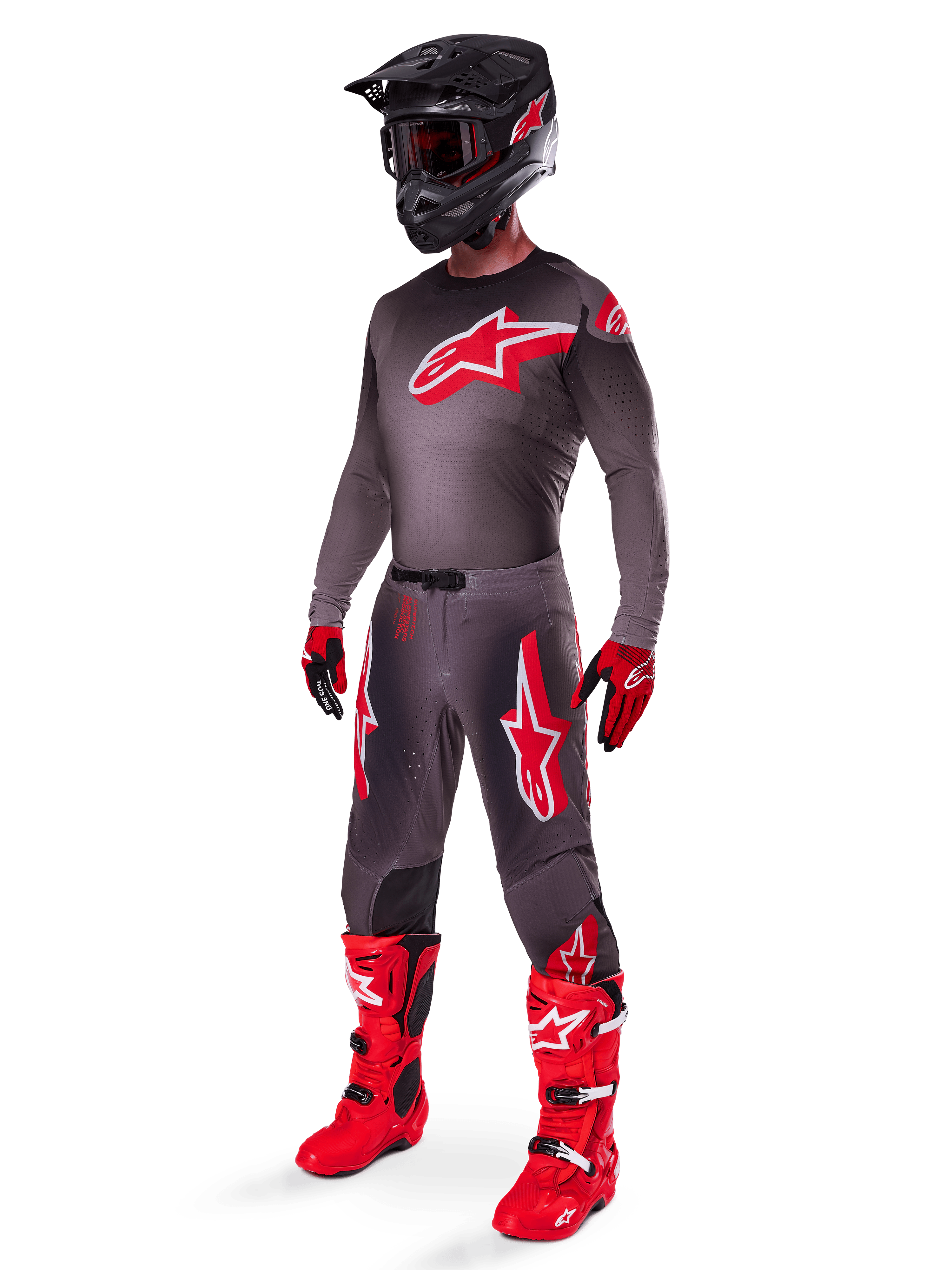 Alpinestars 2025 Supertech Lipan Gear Set, full motocross racing outfit, dark gray and red jersey with large star logo, matching pants with red accents and star graphics, red gloves, and bright red boots with white buckles, including a matte black helmet with red goggles.