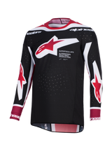Maillot de motocross Alpinestars Supertech AFD Vista 2026, noir, rouge et blanc, doté d'un grand logo Alpinestars en forme d'étoile rouge et blanc sur la poitrine avec l'inscription 'Supertech AFD', tissu en maille perforée pour la ventilation et coupe racing athlétique.
