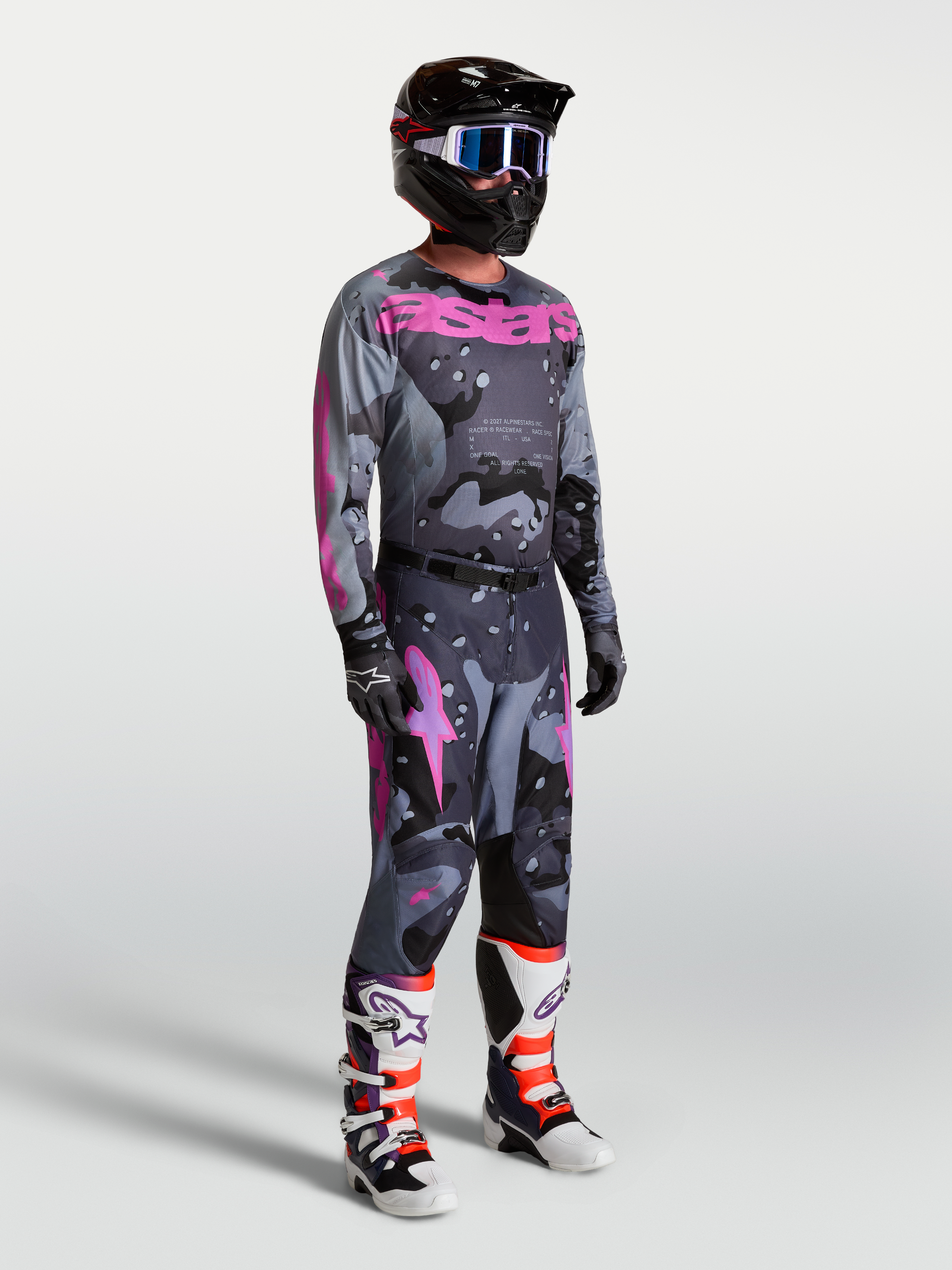 Alpinestars Racer Lone Pants and matching jersey, men's motocross racing set in gray camo and purple.
