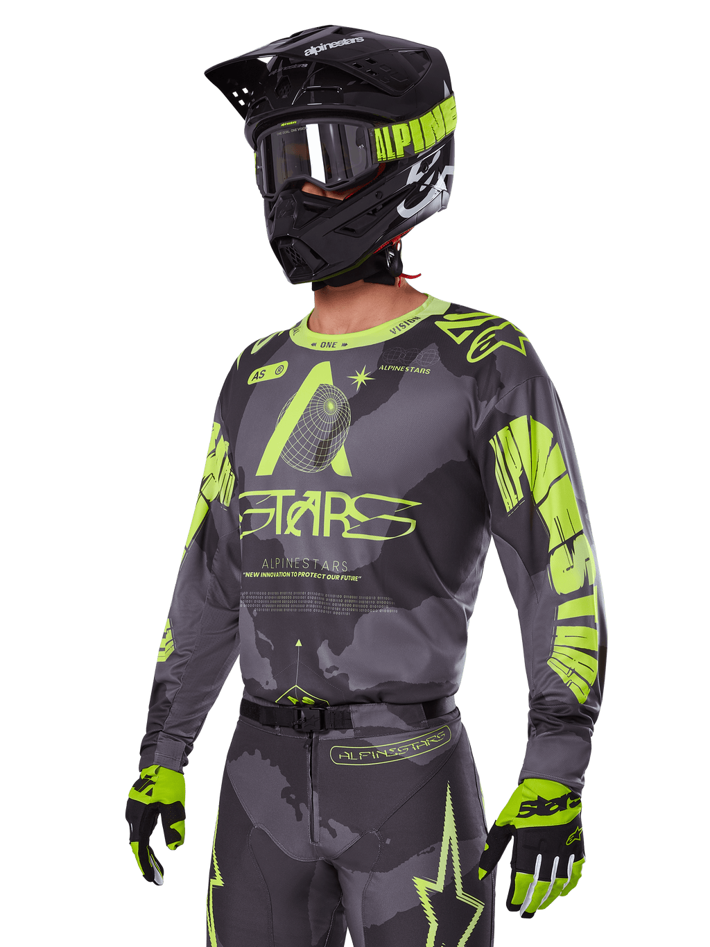 Alpinestars 2025 Racer Hollow Gear Set, Motocross jersey and pants in Gray and Neon Yellow, worn with matching black helmet, goggles, and gloves, featuring bold fluorescent yellow Alpinestars branding and star graphics on a patterned gray base, coordinated professional off-road racing look