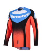 Alpinestars 2026 Techstar Knif Jersey, Motocross Jersey, Orange Black and UCLA Blue, front view featuring a blue chest panel with white Alpinestars logo and a black stippled gradient on the orange sleeves and body, performance off-road racing gear.