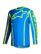 Maillot Alpinestars Fluid Apex 2026, maillot de motocross, bleu et jaune fluo, grand logo étoile jaune fluorescent sur la poitrine, manches longues avec sections bleu marine et bleu vif, marquage vertical sur le bras, équipement sportif tout-terrain