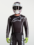 Alpinestars maillot Fluid Apex V2, maillot de motocross pour homme, noir et argenté, grand logo Astars, coupe athlétique.