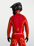 Maillot Alpinestars Fluid Apex V2, tenue motocross homme, rouge et doré, vue de dos, coupe ergonomique et tissu respirant