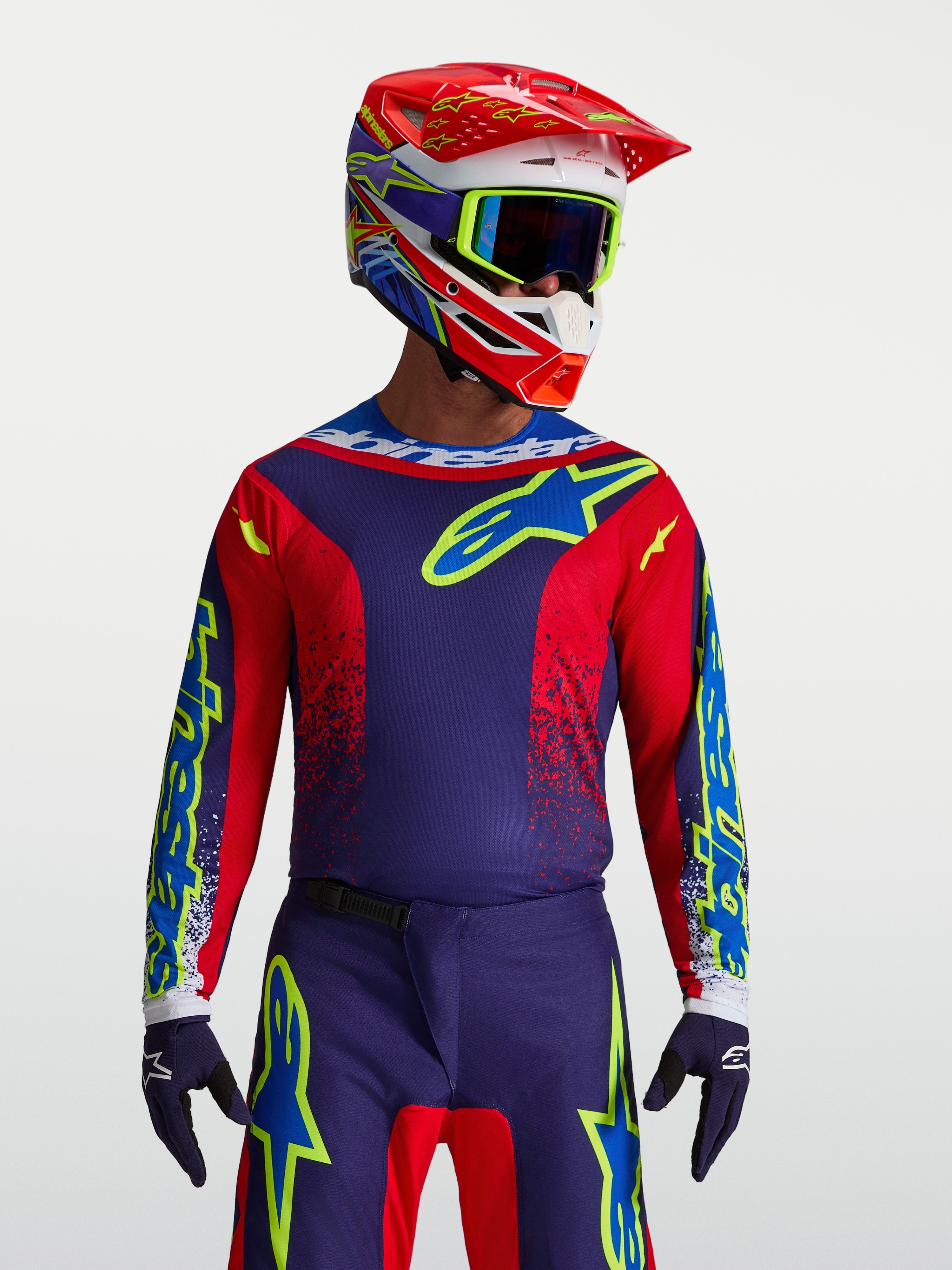Alpinestars maillot Fluid Drag, maillot de motocross pour homme, bleu marine et rouge feu, poly-tissu respirant pour performance tout-terrain.