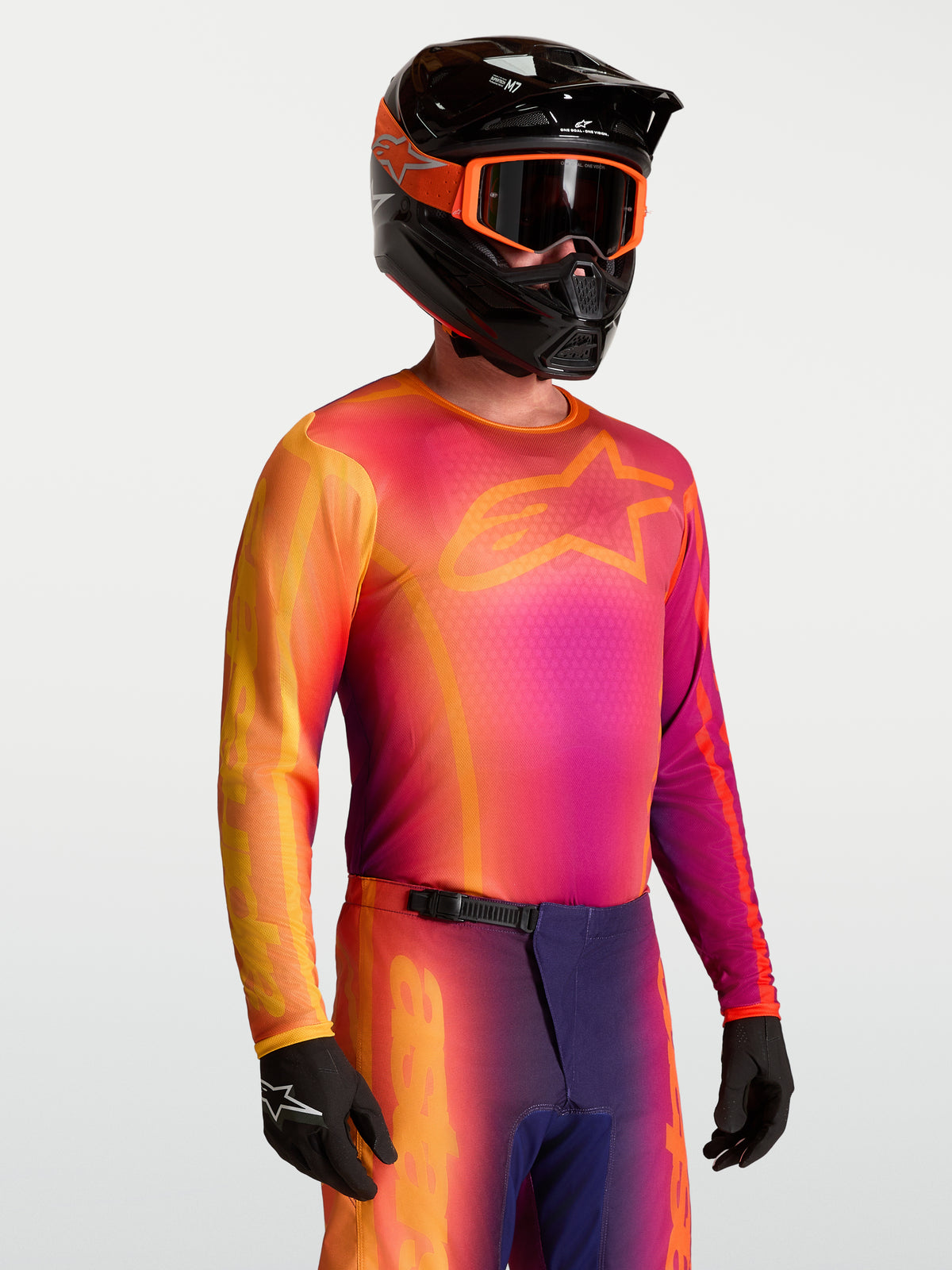 Alpinestars Maillot Fluid Kepler, maillot de motocross pour homme, violet et orange, tissu technique respirant.