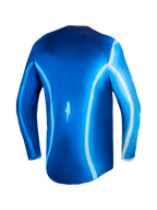Maillot Alpinestars Fluid Kepler bleu et blanc, maillot de motocross tout-terrain avec vue arrière sur l'ourlet allongé.