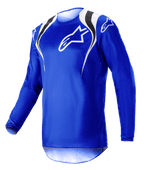 Maillot Alpinestars Fluid Narin 2023, maillot de motocross, bleu, blanc et noir avec des accents aux épaules et un logo blanc sur la poitrine, design léger à manches longues pour la course tout-terrain