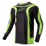 Maillot Alpinestars Fluid Lurv 2024, maillot de motocross, noir et jaune fluo, doté de panneaux incurvés jaune fluo audacieux, du logo Alpinestars sur la poitrine et d'un lettrage autour du col, coupe sport athlétique pour la course tout-terrain