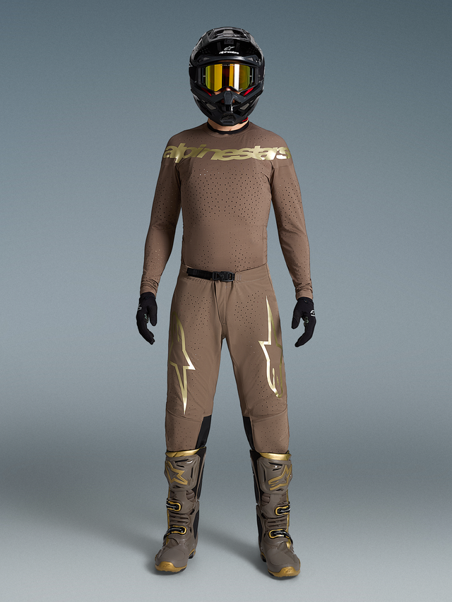 Limited Edition Supertech Air Gold Gear Set, tan motocross outfit with metallic gold logos, matching boots and helmet.