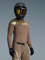 Maillot Supertech Air Gold Édition Limitée Alpinestars, maillot de motocross pour homme, marron et doré, coupe athlétique.