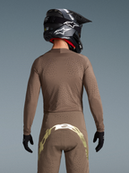 Tenue Alpinestars Supertech Air Gold Édition Limitée, marron et dorée, motocross, vue de dos, ventilation découpée au laser.