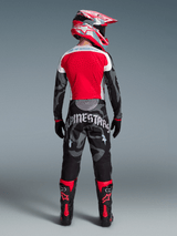 Pantalon Techstar Beast Coast Édition Limitée, kit motocross Alpinestars camouflage rouge et gris, vue de dos.