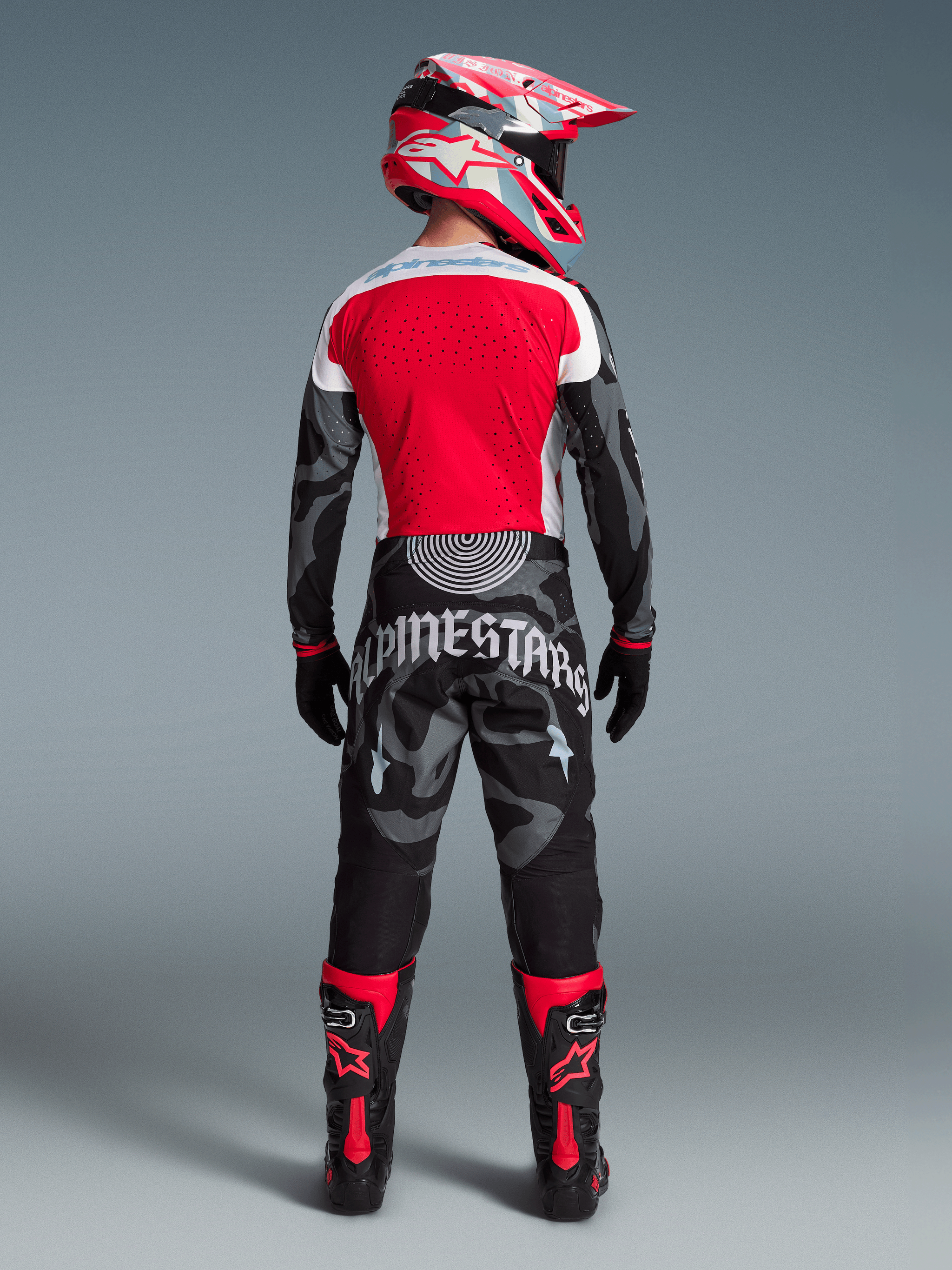 Pantalon Techstar Beast Coast Édition Limitée, kit motocross Alpinestars camouflage rouge et gris, vue de dos.
