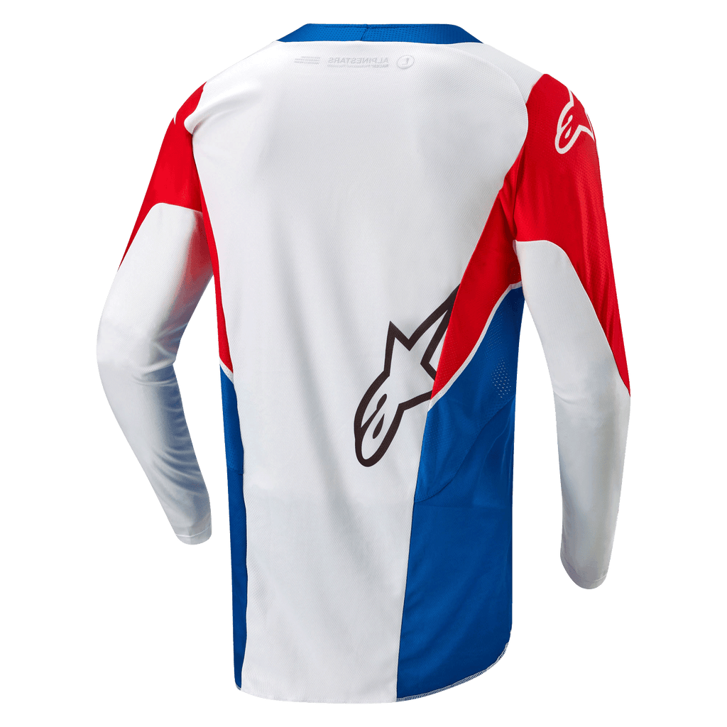 Alpinestars Maillot Honda Racer Iconic, maillot de moto tout-terrain, blanc, bleu vif et rouge vif, vue de dos montrant l'ourlet allongé et la construction légère évacuant l'humidité
