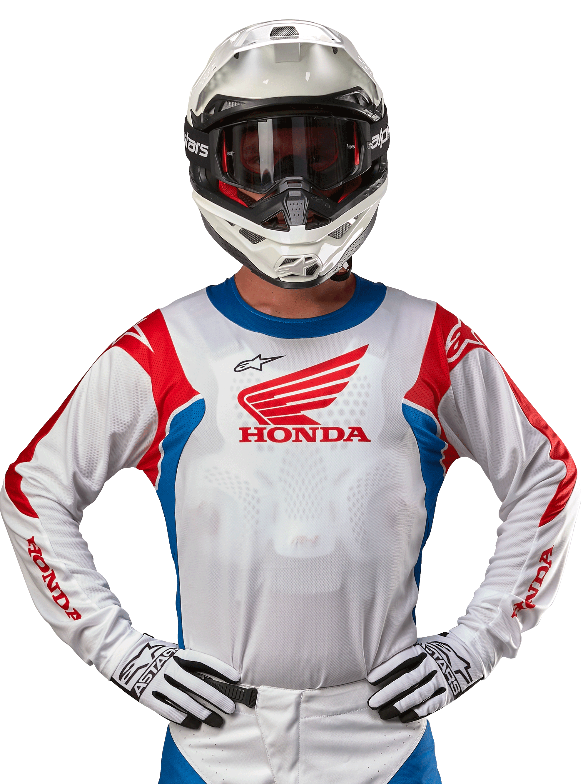 Maillot Honda Racer Iconic, maillot de motocross blanc avec un logo Honda rouge et des accents bleu et rouge vifs, porté par un pilote avec un casque et des gants blancs, équipement de performance pour le tout-terrain et le motocross