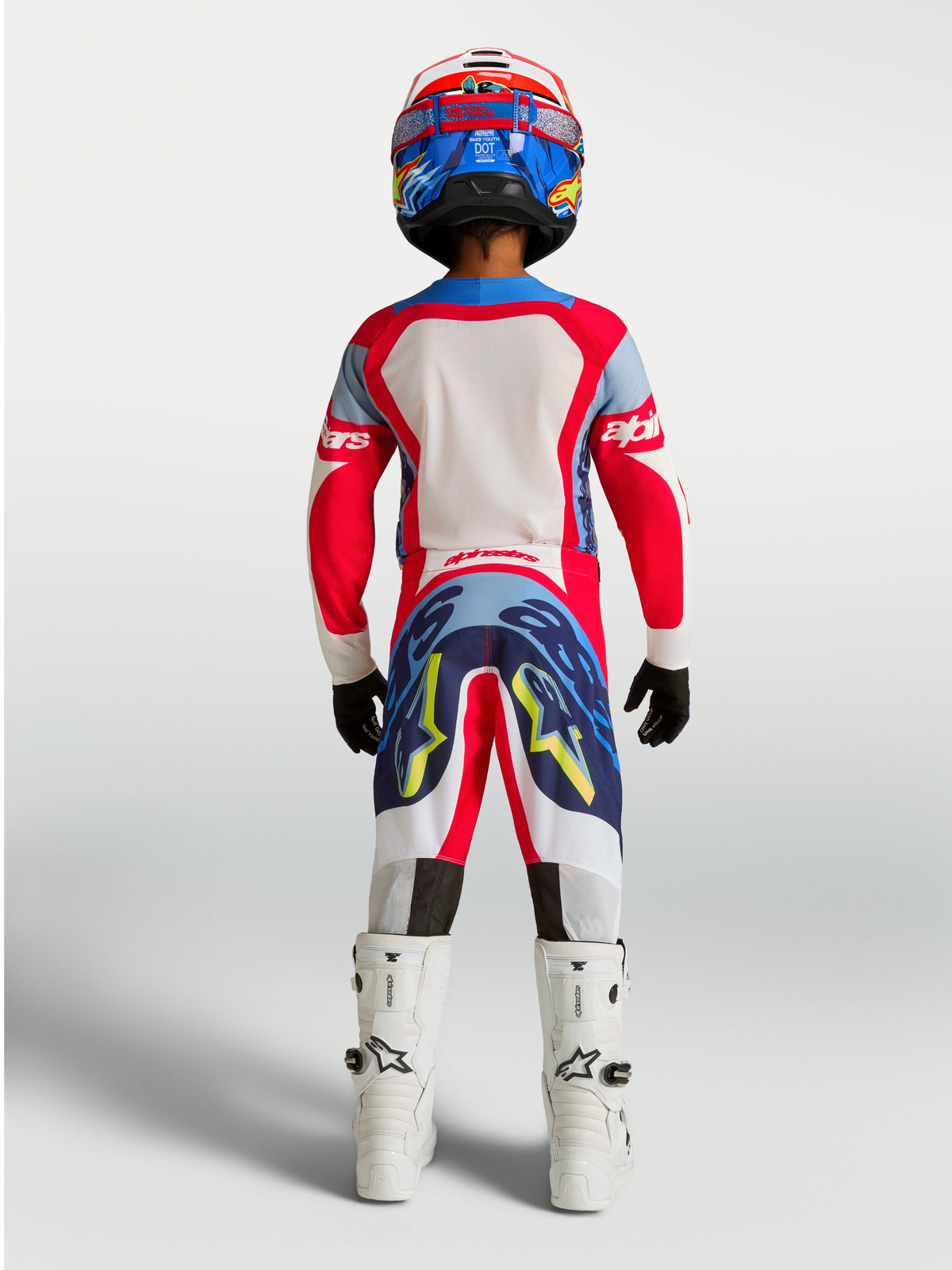Alpinestars Supertech Dyna junior, maillot et ensemble de motocross, rouge feu et bleu marine, tenue de course vue de dos
