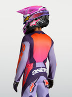 Alpinestars Maillot Fluid Hunt Junior 2027, maillot de motocross violet et rose, tissu léger évacuant l'humidité.