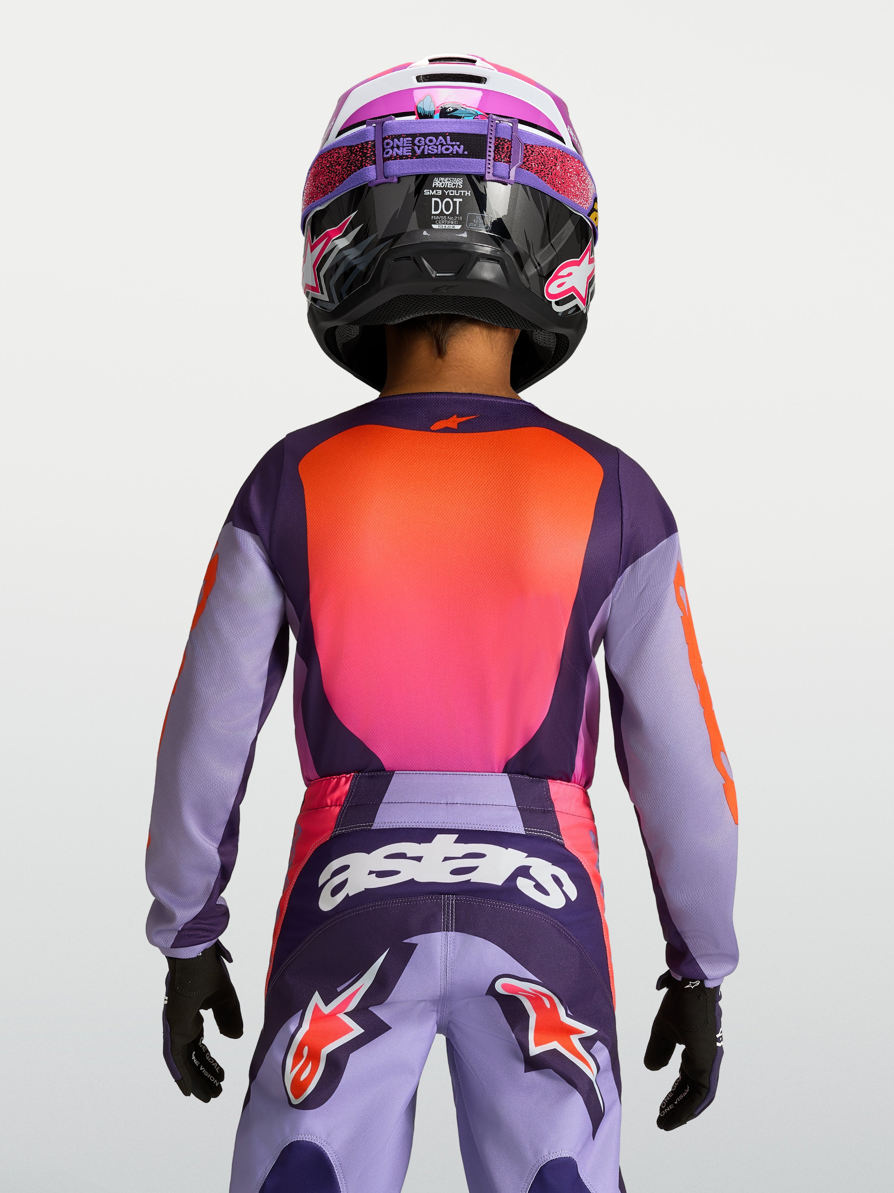 Alpinestars Maillot Fluid Hunt Junior, maillot de motocross pour enfant, violet et rose, vue de dos, tissu respirant évacuant l'humidité et coupe ergonomique pour le tout-terrain