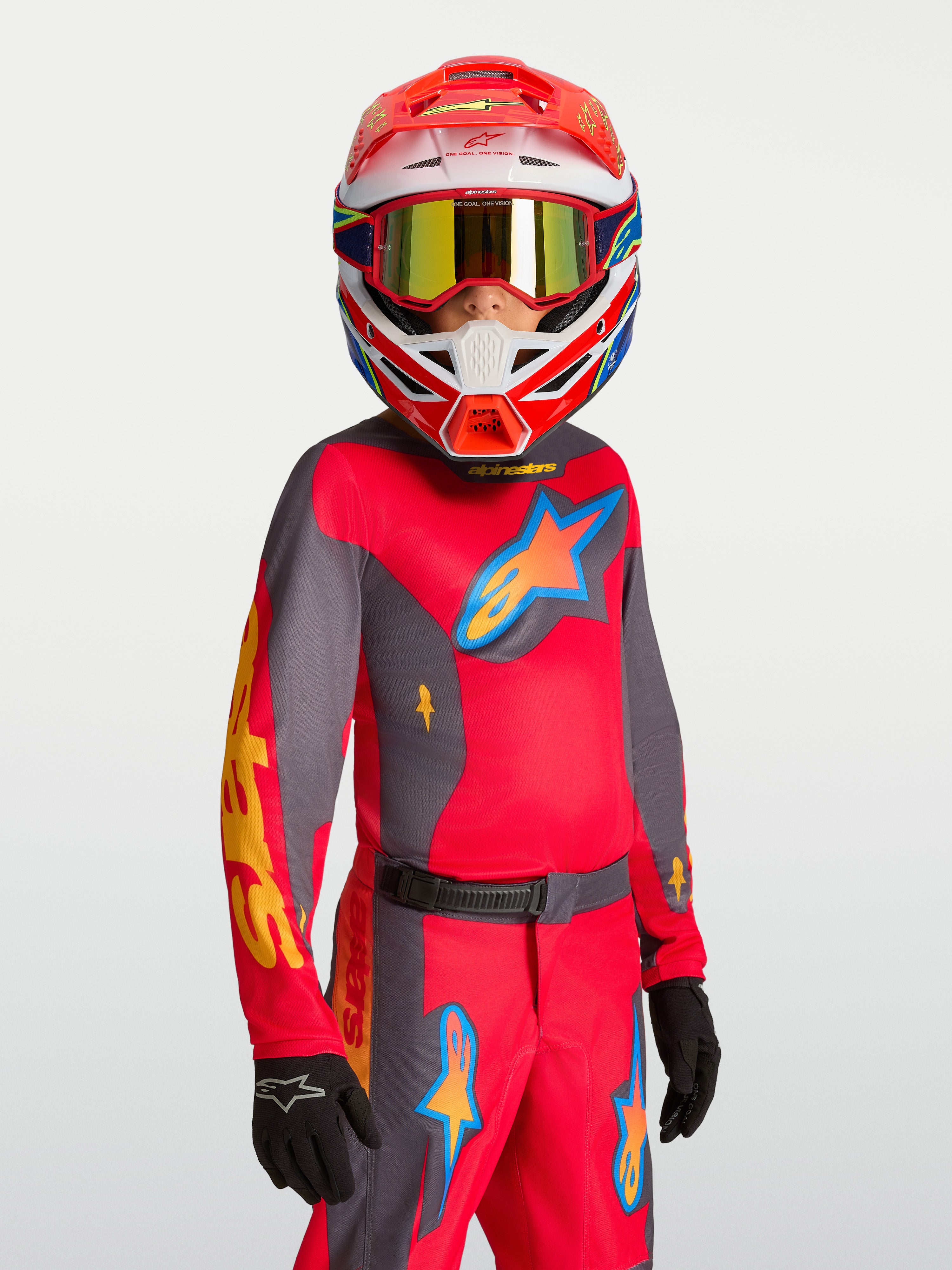 Alpinestars maillot Fluid Hunt Junior 2027, maillot de motocross rouge et gris pour enfant, respirant évacuant l'humidité.