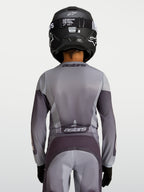Alpinestars Maillot Fluid Amber Junior 2027, maillot de motocross gris et sable, textile respirant, vue de dos