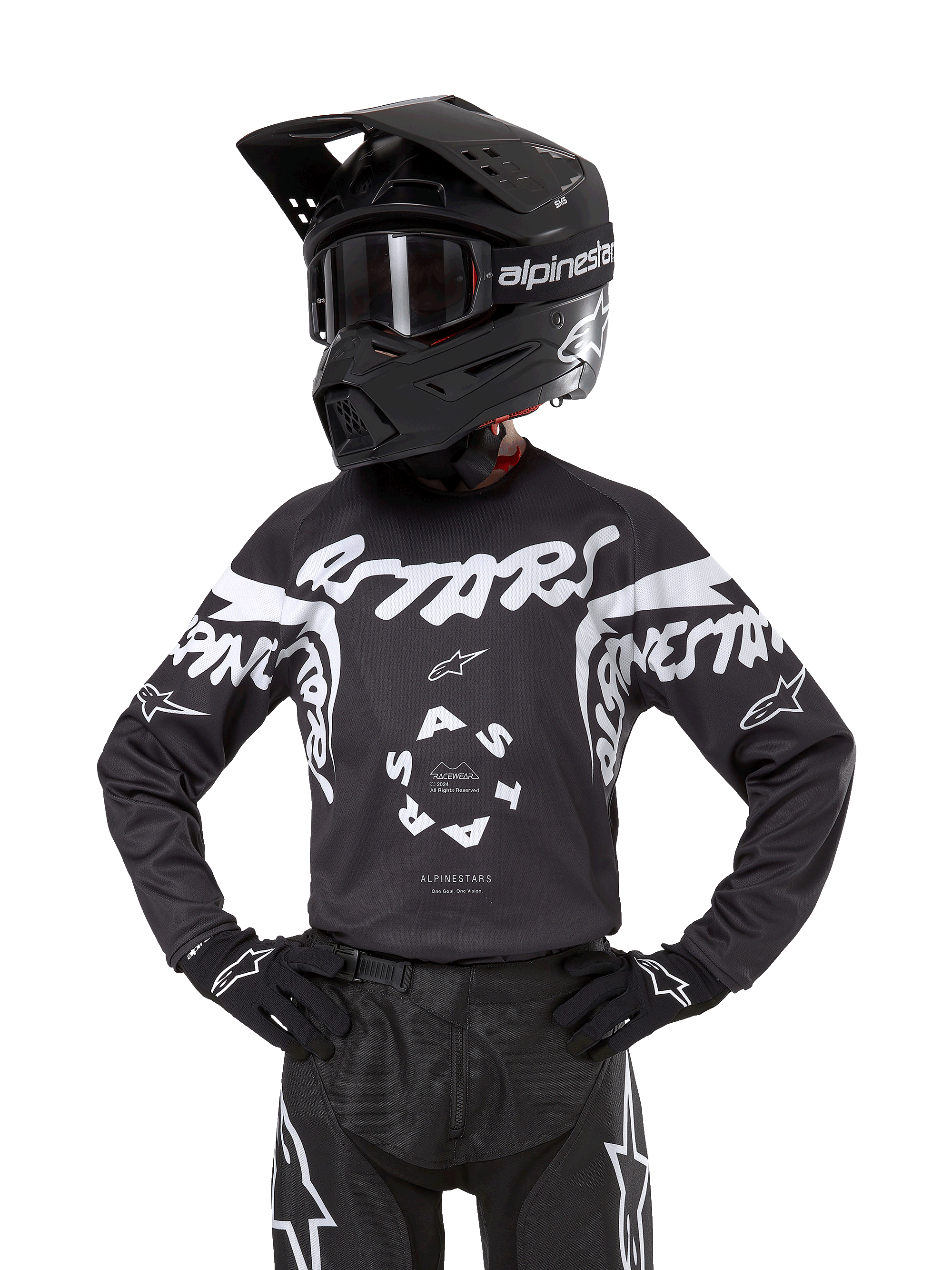 Alpinestars Youth 2024 Racer Hana Jersey, maillot de motocross pour enfant, noir et blanc, design graphique avec logos, porté avec un casque et des gants assortis, équipement de protection tout-terrain