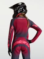 Alpinestars Stella Techstar Swan Jersey, Women's Motocross Gear, Crimson and Dark Gray, moisture-wicking stretch fabric on model.