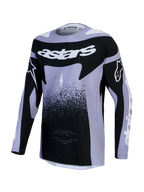 Maillot Alpinestars Stella Techstar Swan, maillot de motocross pour femme, violet clair et noir, design de course avec graphismes Swan et logo blanc, tissu technique léger.