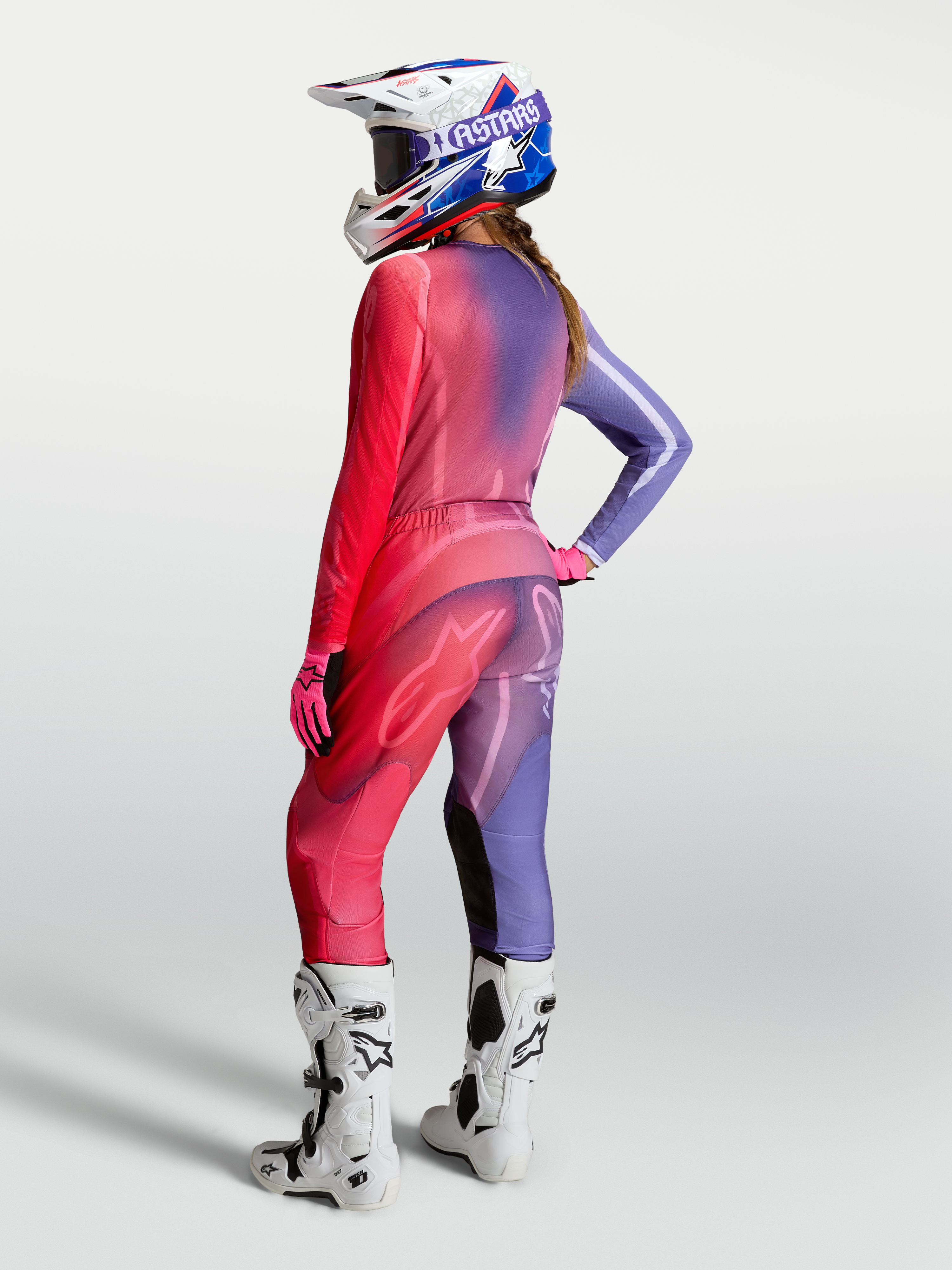 Alpinestars Stella Fluid Kepler Jersey, Women's Motocross Jersey, Purple and Rouge Red, shown with matching pants and boots.