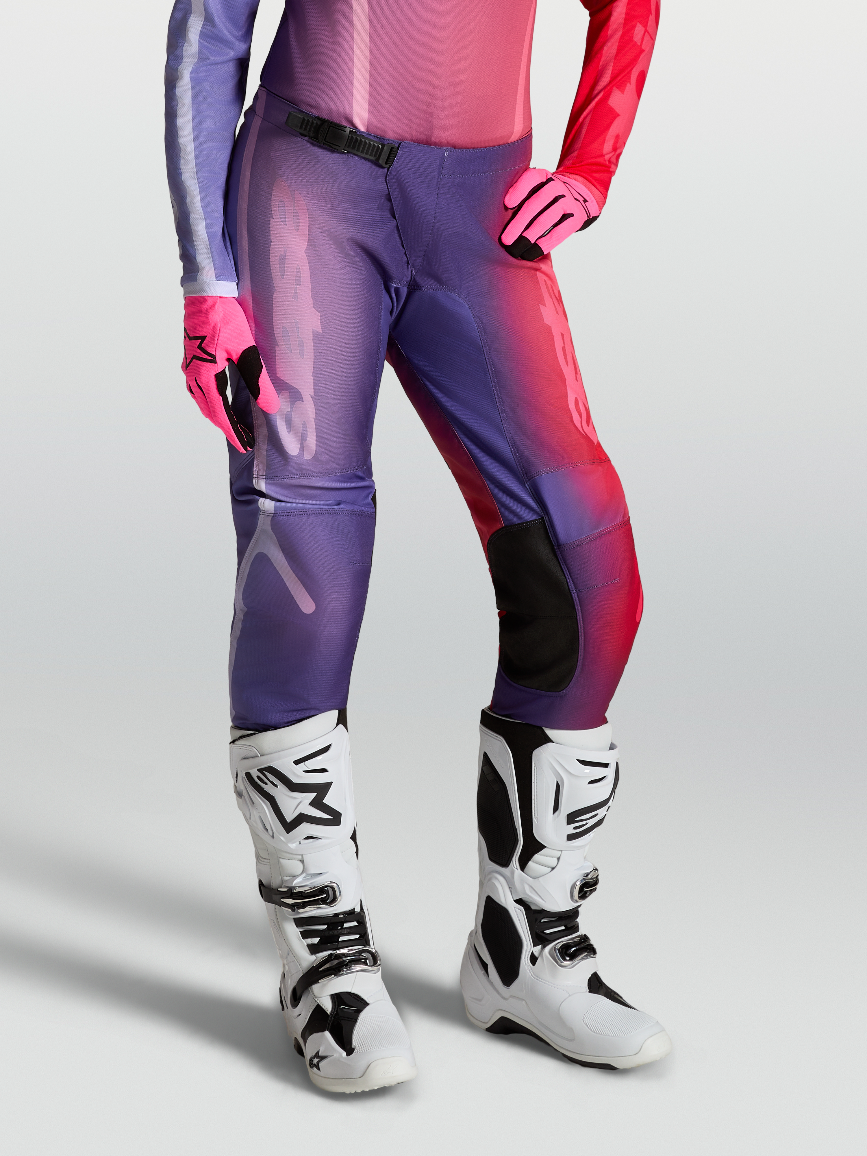 Alpinestars Stella Fluid Kepler Pants, women's motocross gear in purple and rouge red, featuring a durable textile construction.
