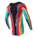 Maillot Alpinestars Stella Techstar Femme 2024, maillot de motocross, noir multicolore, vue arrière avec motif ondulé éclatant rouge, jaune et turquoise, logo Astar blanc en bas du dos, marquage Alpinestars sur les manches