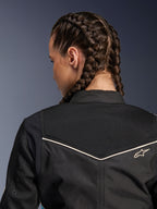 Veste Alpinestars Stella T-Dyno Air, veste de moto pour femme, noire avec accents écru, vue rapprochée de l'empiècement dorsal dotée de maille 3D étendue pour la ventilation et d'un petit logo Alpinestars brodé
