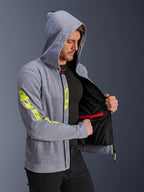 Alpinestars Chrome V2 Sport Hoodie, Gray Heather and Fluorescent Yellow, man wearing hoodie with hood up, unzipped showing black mesh interior lining and internal red zippered pocket, large yellow logo on sleeve, casual urban motorcycle riding gear