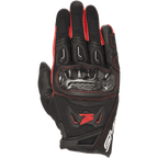 Gants Alpinestars Honda SMX-2 Air Carbon V2, gants de moto sport, noirs et rouges, dotés d'une protection des articulations en fibre de carbone, coque en cuir et mesh 3D, logo de l'aile Honda rouge et surpiqûres, conception à manchette courte pour la conduite sportive sur route.