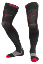 Alpinestars MX Long Tech Thick Socks, Motocross Riding Socks, Black and Red, mid-thigh length with red branding, grey and red sole details, technical fabric designed for off-road racing and dirt bike boots