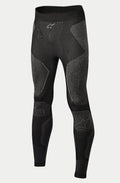 Alpinestars Ride Tech Bottom Winter, pantalon de sous-couche moto, noir et gris, avec panneaux en maille double densité aux motifs texturés, construction sans couture, logos Alpinestars sur la taille et les tibias, conçu pour la conduite par temps froid