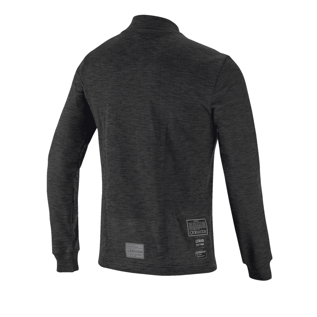 Haut à manches longues Alpinestars Race V3, vue de dos, couche de base ignifuge noire, présentant une conception en maille texturée, des manches longues avec poignets côtelés et des étiquettes d'homologation FIA sur le bas du dos.
