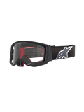 Lunettes Alpinestars Supertech Corp, lunettes de motocross, noires avec intérieur rouge, verre transparent, sangle noire avec grand logo étoile blanc, marquage « ONE GOAL. ONE VISION. », protection oculaire haute performance pour le tout-terrain
