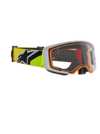 Masque Alpinestars Supertech Corp, masque de motocross, jaune fluo et gris, écran clair avec accents orange sur la monture, bandeau jaune fluo avec logo Alpinestars noir, pour la course tout-terrain.