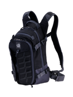 Alpinestars AT-15 Back Pack, technical motorcycle backpack, Black and Deep Gray, featuring a rugged front MOLLE panel, adjustable compression straps, padded shoulder straps with magnetic chest lock, and All Terra logo, designed for adventure off-road riding
